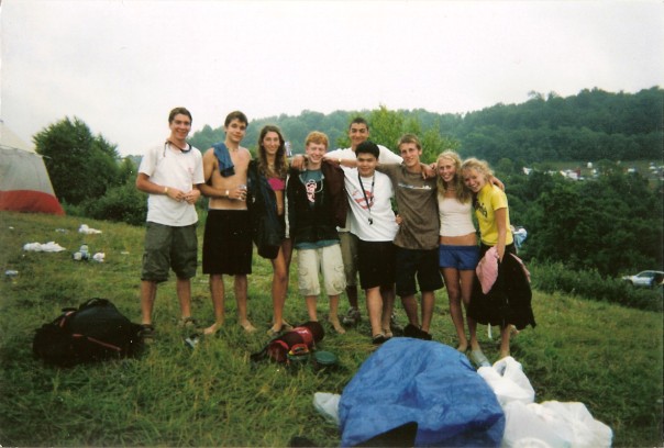 A photo of Alan with friends on a festival
