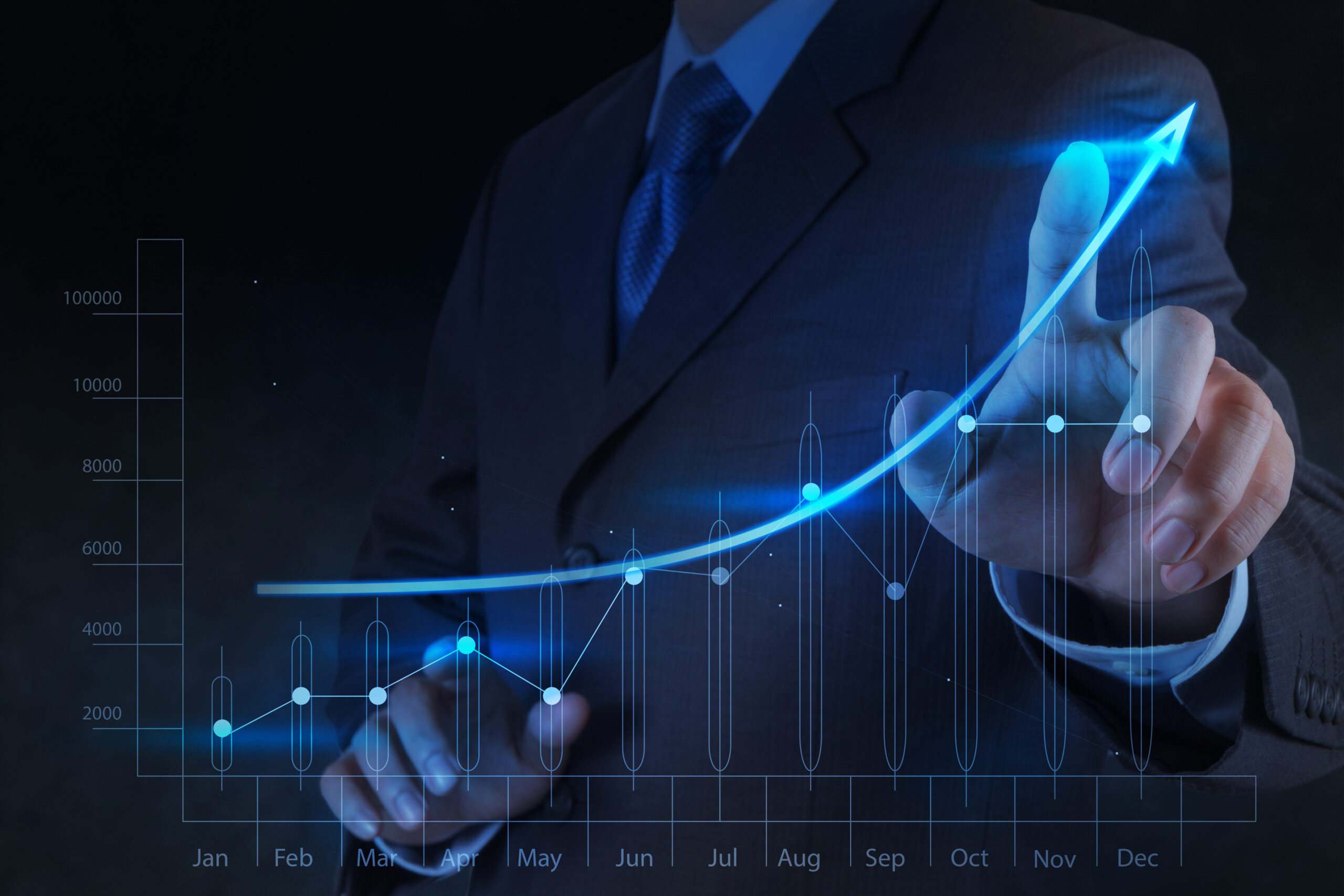 A growing chart with a man's hand