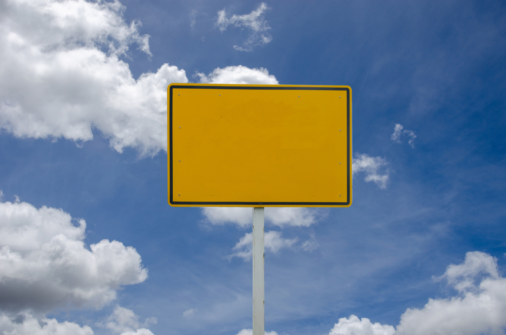 Yard sign under the sky