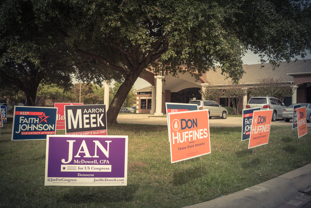 A yard with a lot of signs